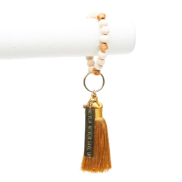 ME™ Kenya Brass Tassel Bracelet Keychain - Never Give Up